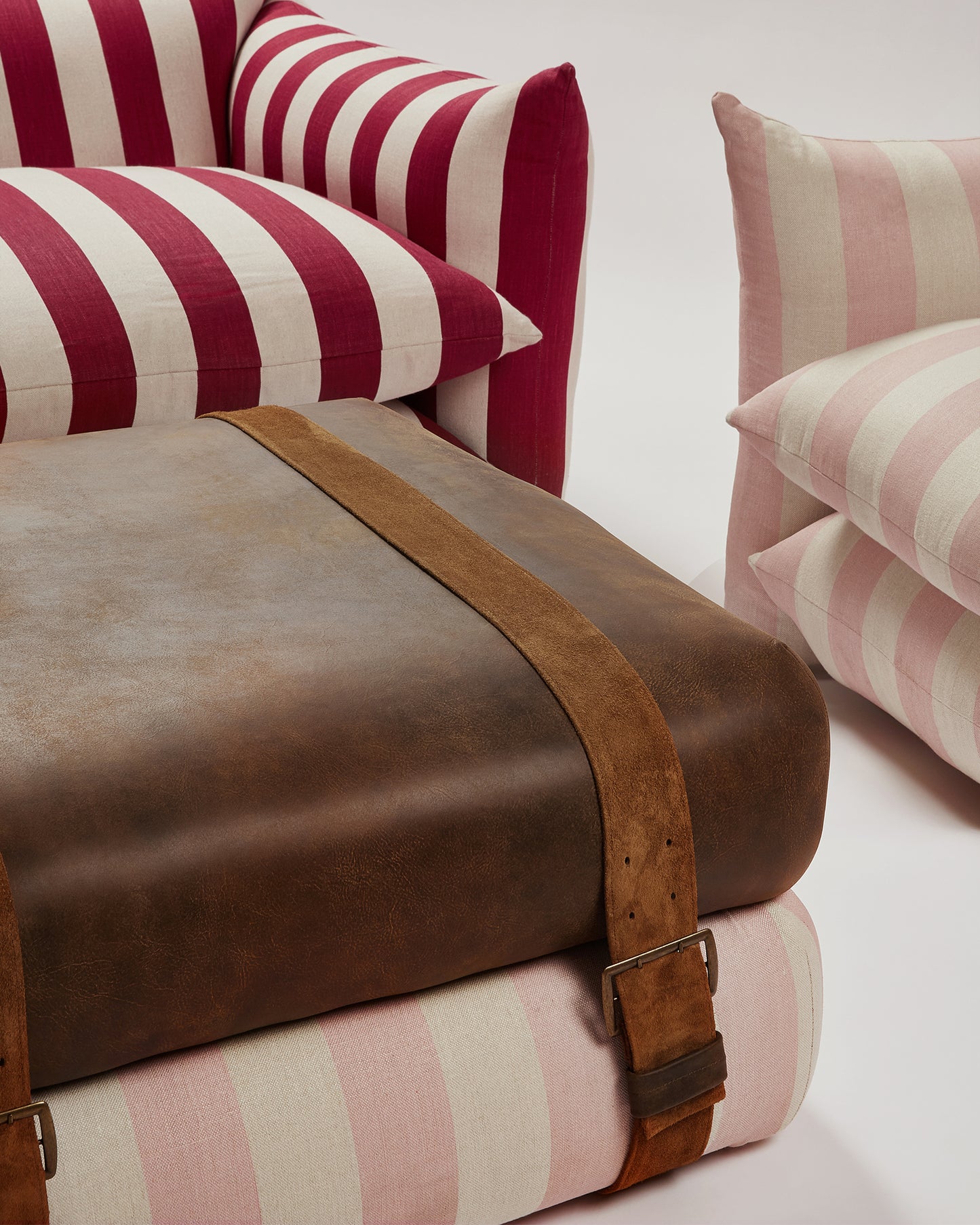 Studio Ottoman in Rose Studio Stripe, with straps