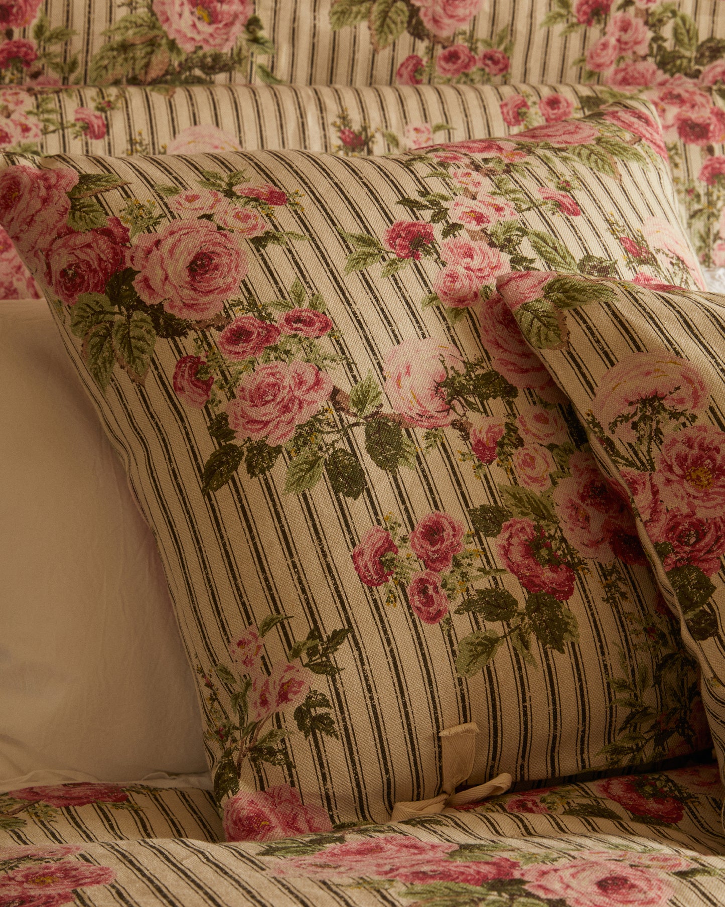Cushion in Ticking Rose™