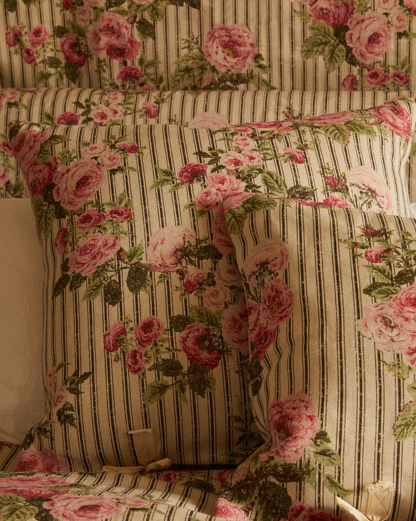 Cushion in Ticking Rose™