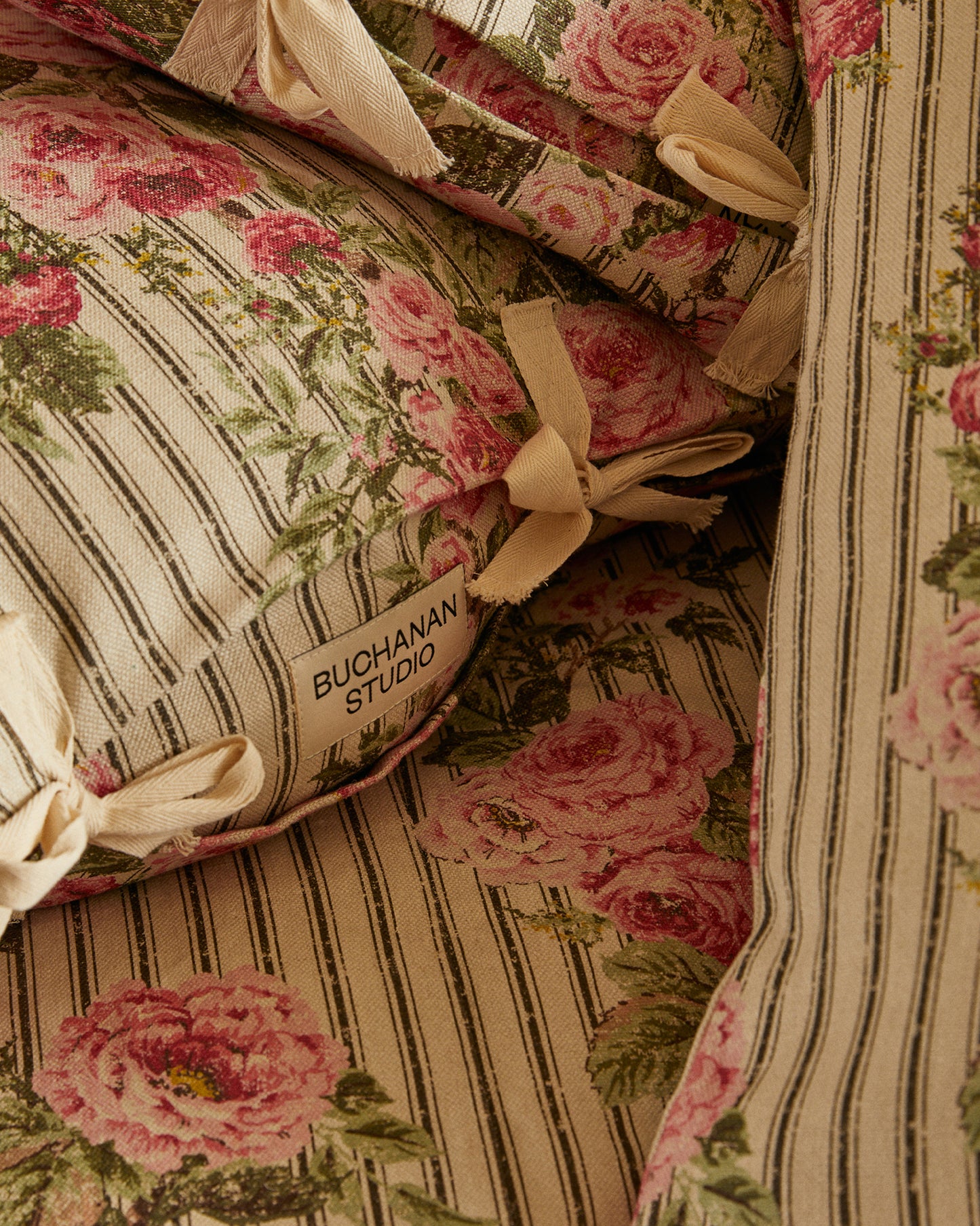 Cushion in Ticking Rose™