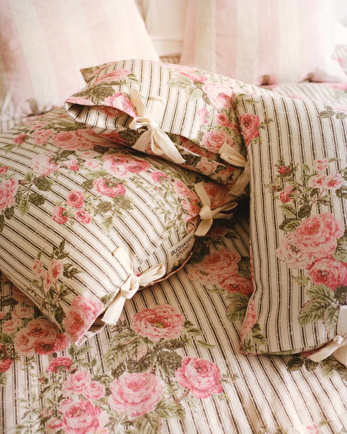 Cushion in Ticking Rose™