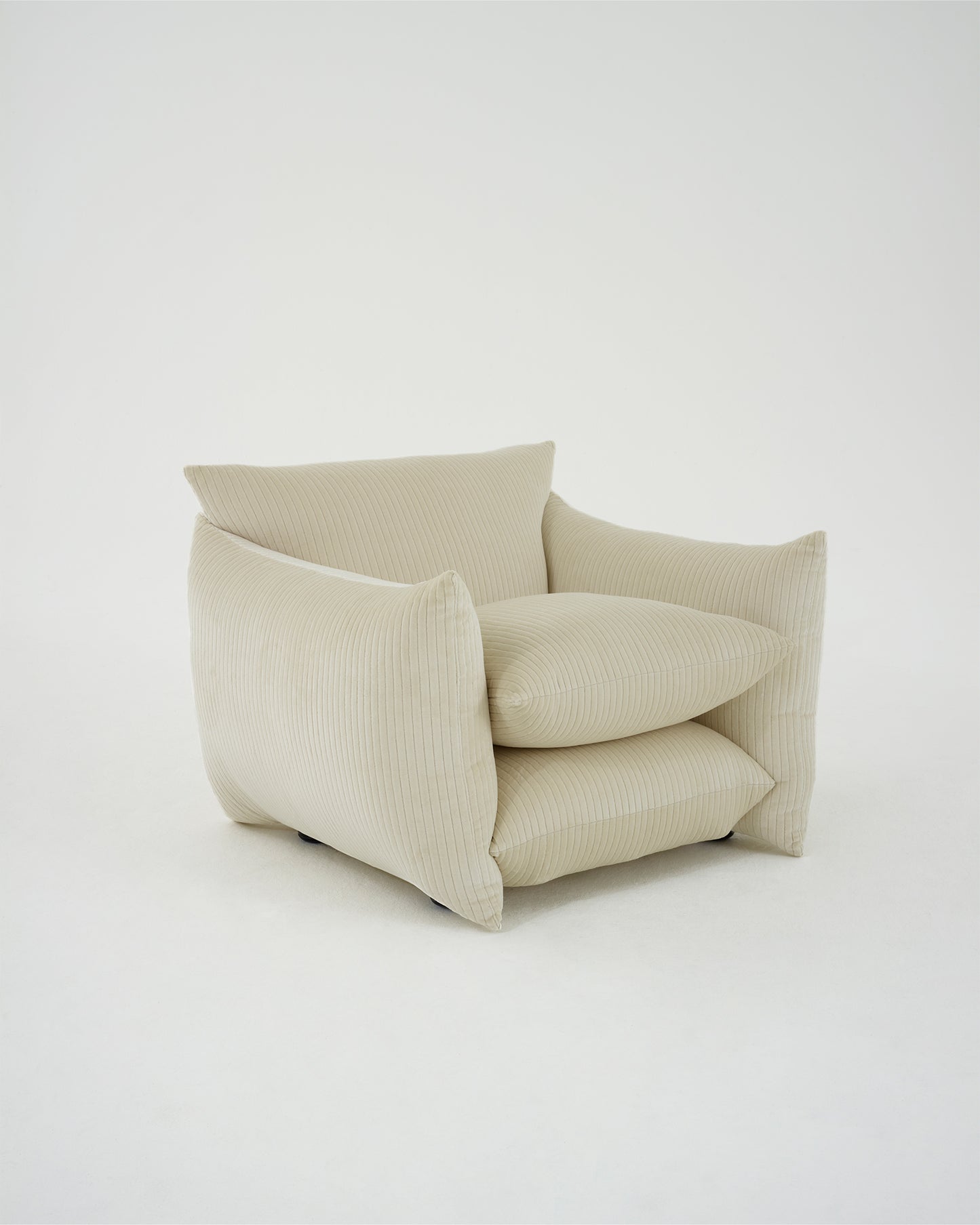 Studio chair in 'milk' and 'cocoa' jumbo cord