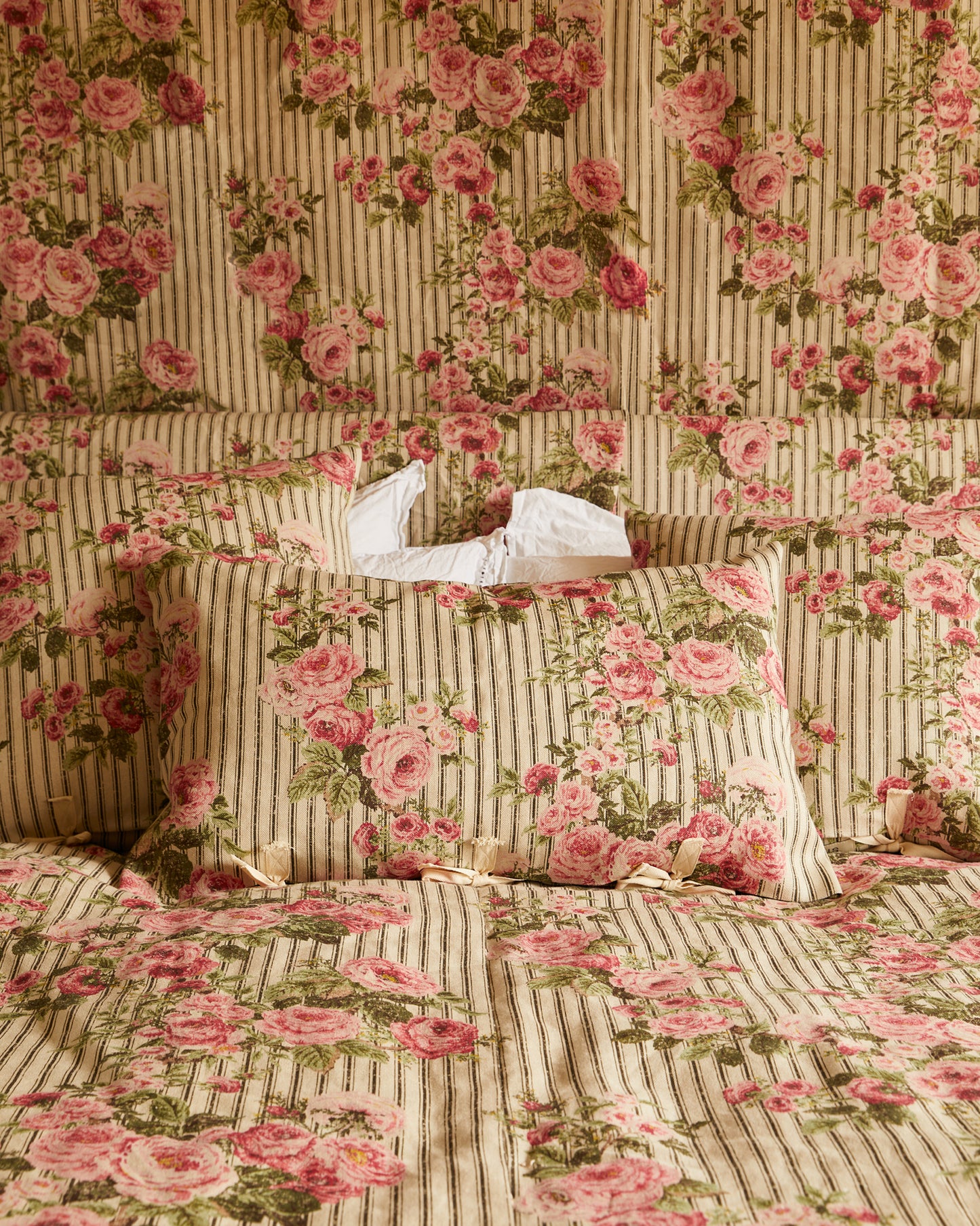 Cushion in Ticking Rose™