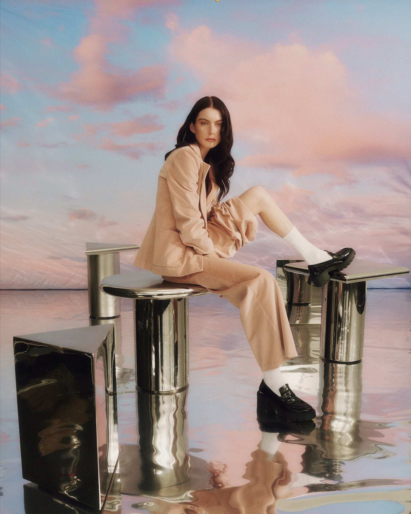 Model sits on Circular Shape Table, with Small Prism Table visible in foreground
