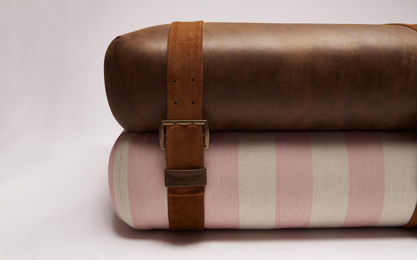 Studio Ottoman in Rose Studio Stripe, with straps