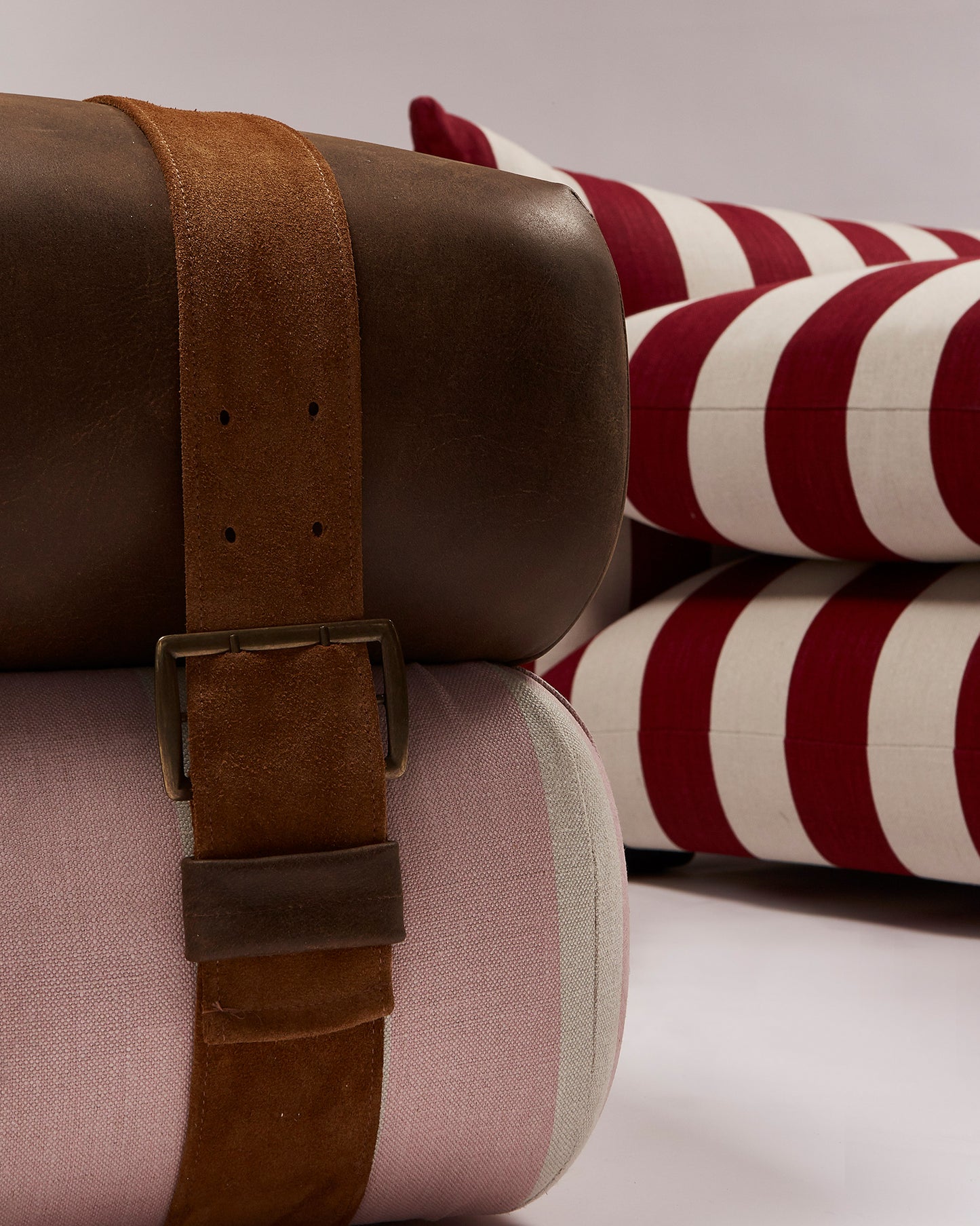 Studio Ottoman in Rose Studio Stripe, with straps
