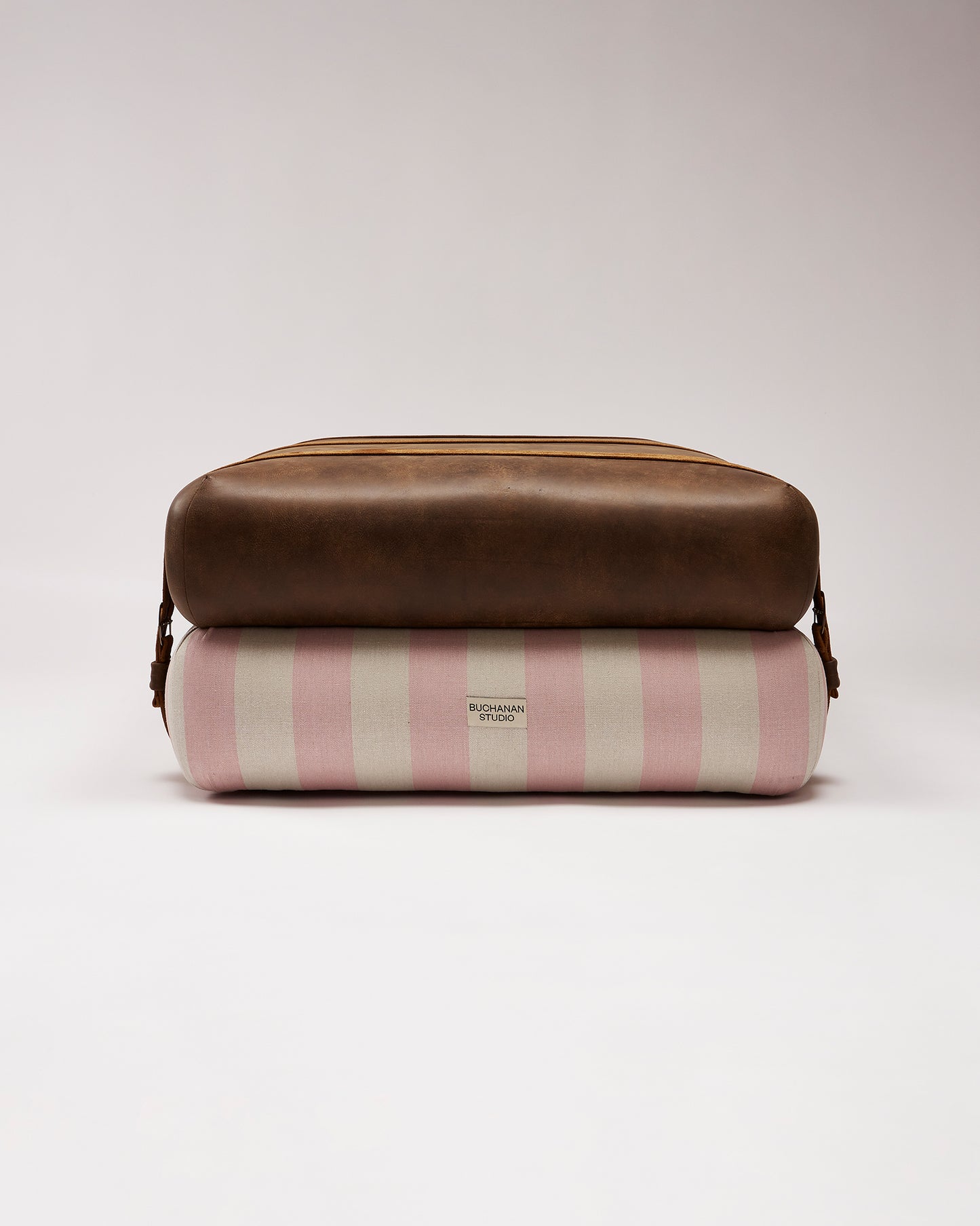 Studio Ottoman in Rose Studio Stripe, with straps