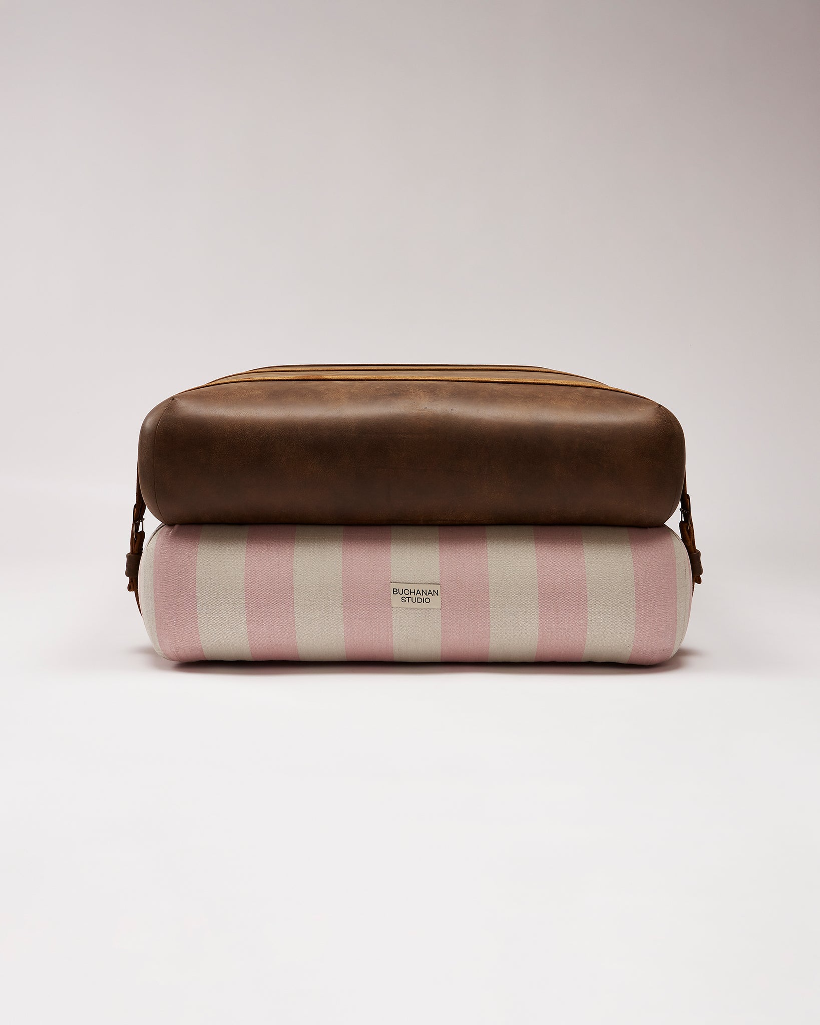 Studio Ottoman in Rose Studio Stripe, with straps